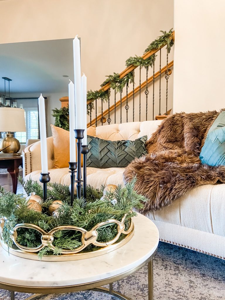 A cozy living room with garland accents.