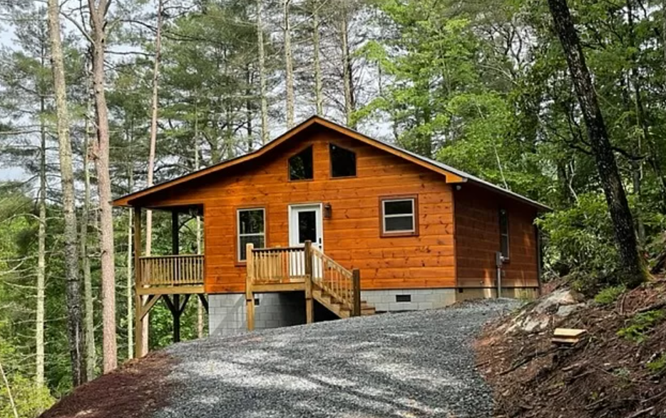 Image of a cabin in the woods.