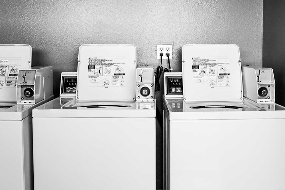 Coin operated washer and dryer.