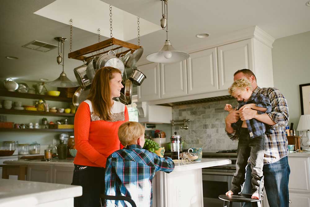 young family in kitchen