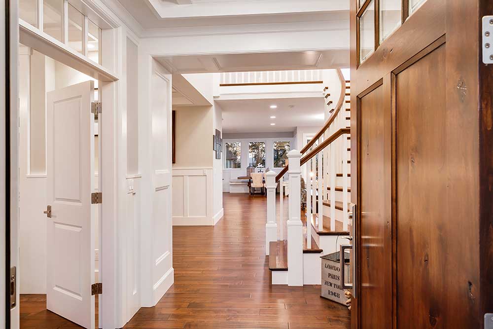 Hallway interior of home with wood floors
