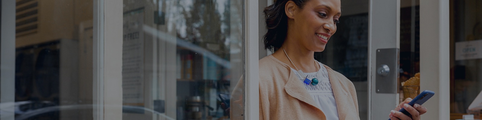 woman looking at phone