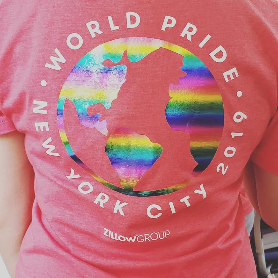 Photo of a light red t-shirt that reads World Pride 2019 New York City