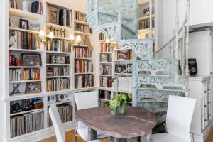 Barbara Corcoran's penthouse dining room with spiral staircase