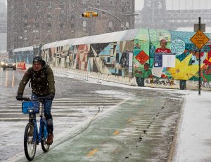 image of bike commuter in brooklyn