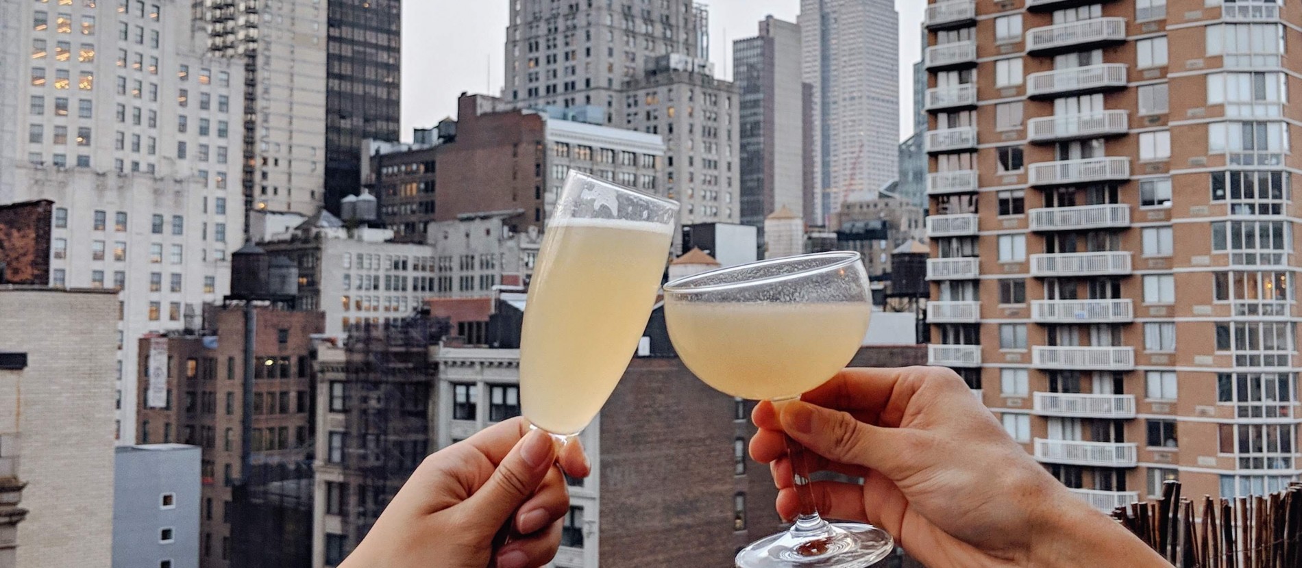 champagne toast over nyc skyline