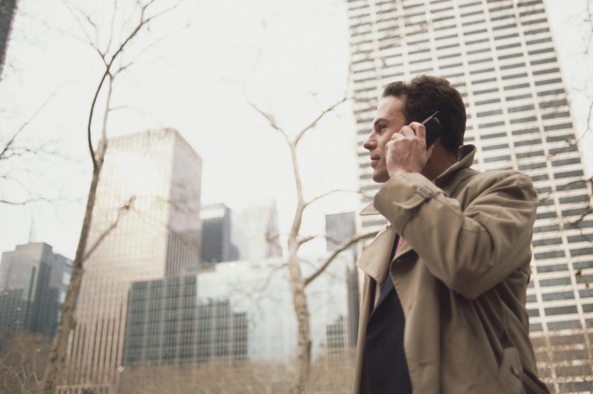Man in NYC park talking on phone
