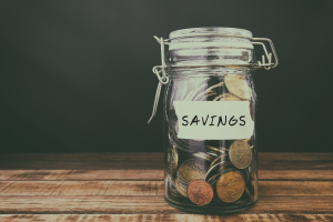 Jar of coins labeled savings