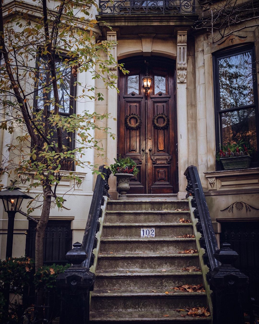 StreetEasyFinds NYC townhouse with wood doors
