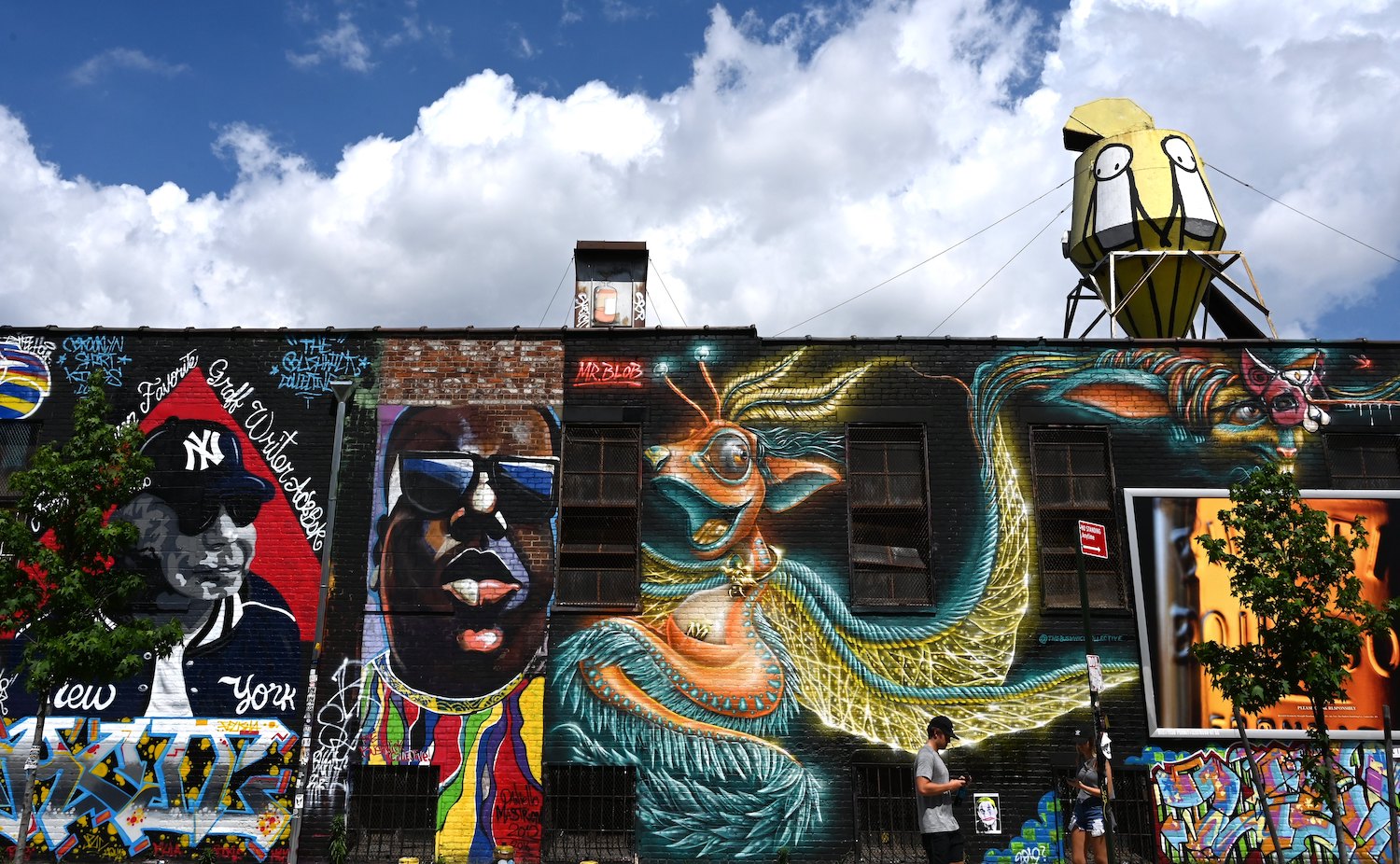 vibrant murals lining a street in Bushwick Brooklyn
