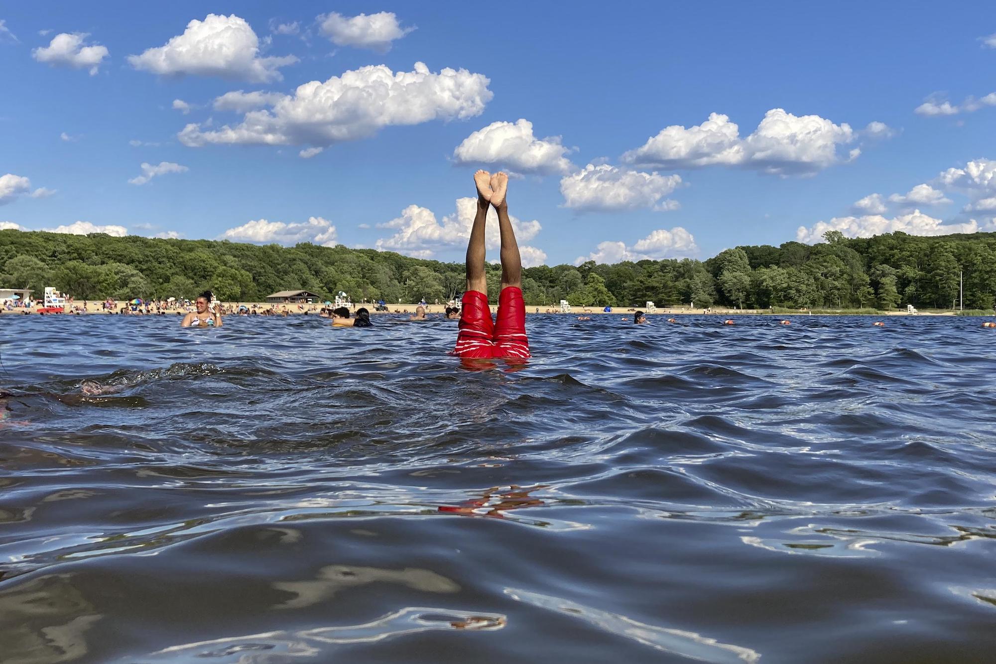 weekend getaway from nyc people swimming at Harriman State Park