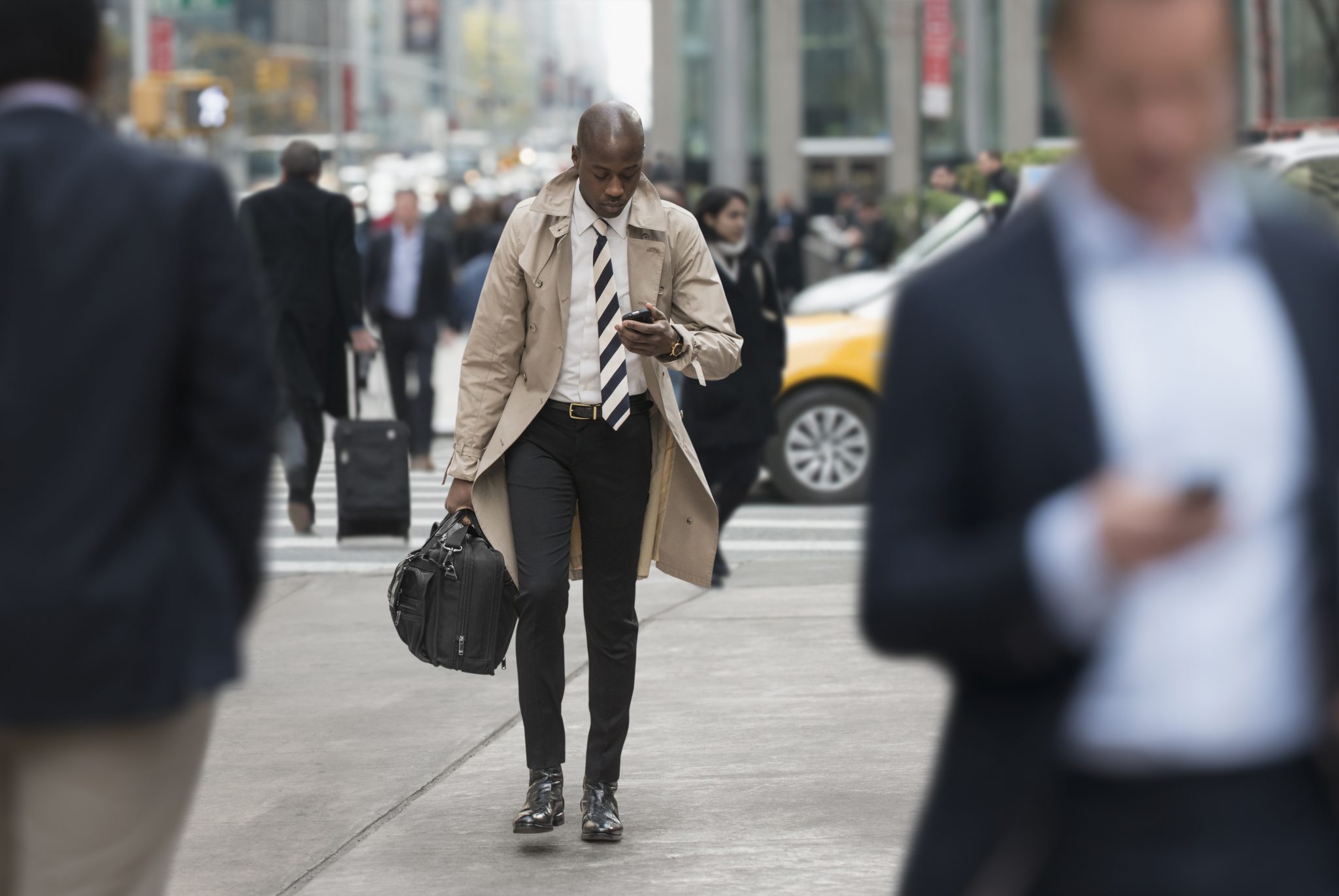 Image of nyc real estate agent doing business on the street