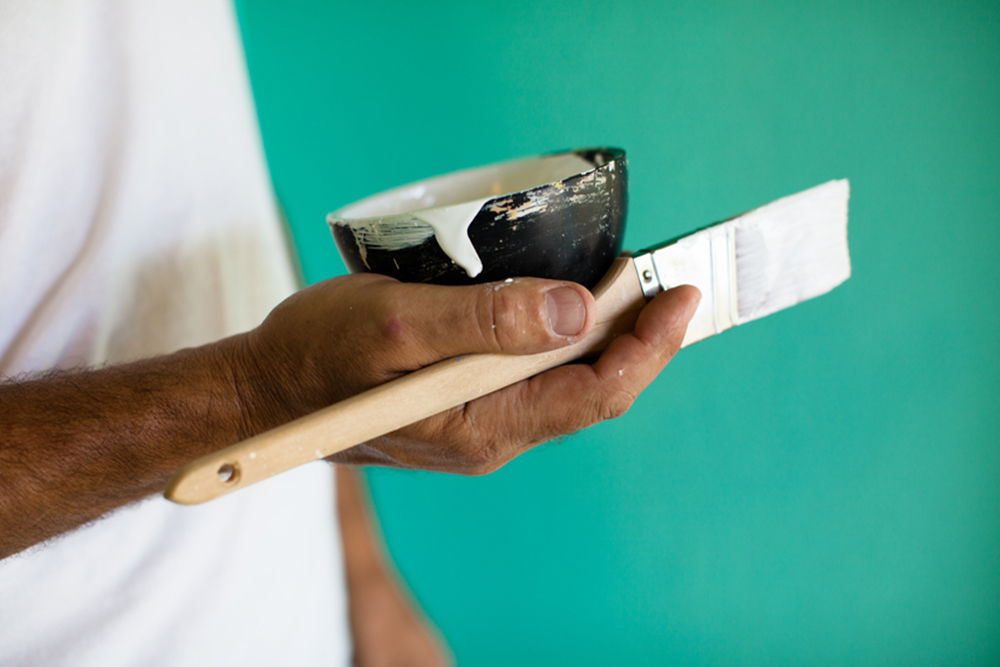 Man holding a paint brush