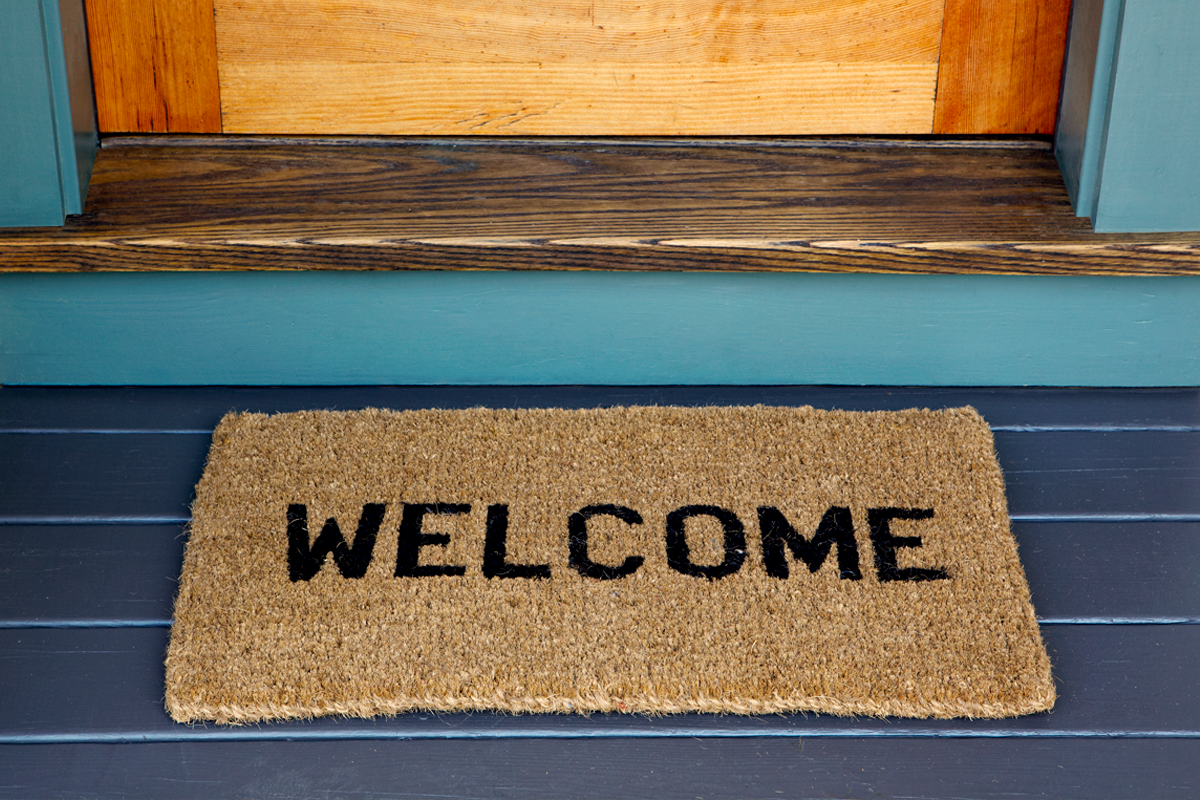 welcome mat in front of door